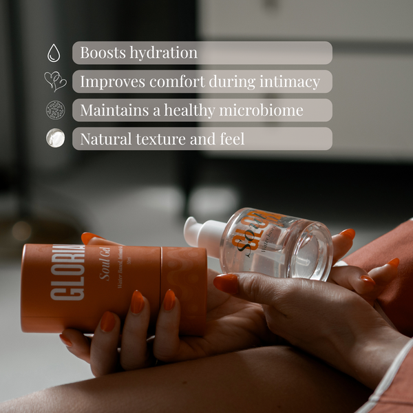 A person holds an open bottle of Soul Gel lubricant next to its orange tube packaging, with text overlays highlighting product benefits such as hydration and comfort.